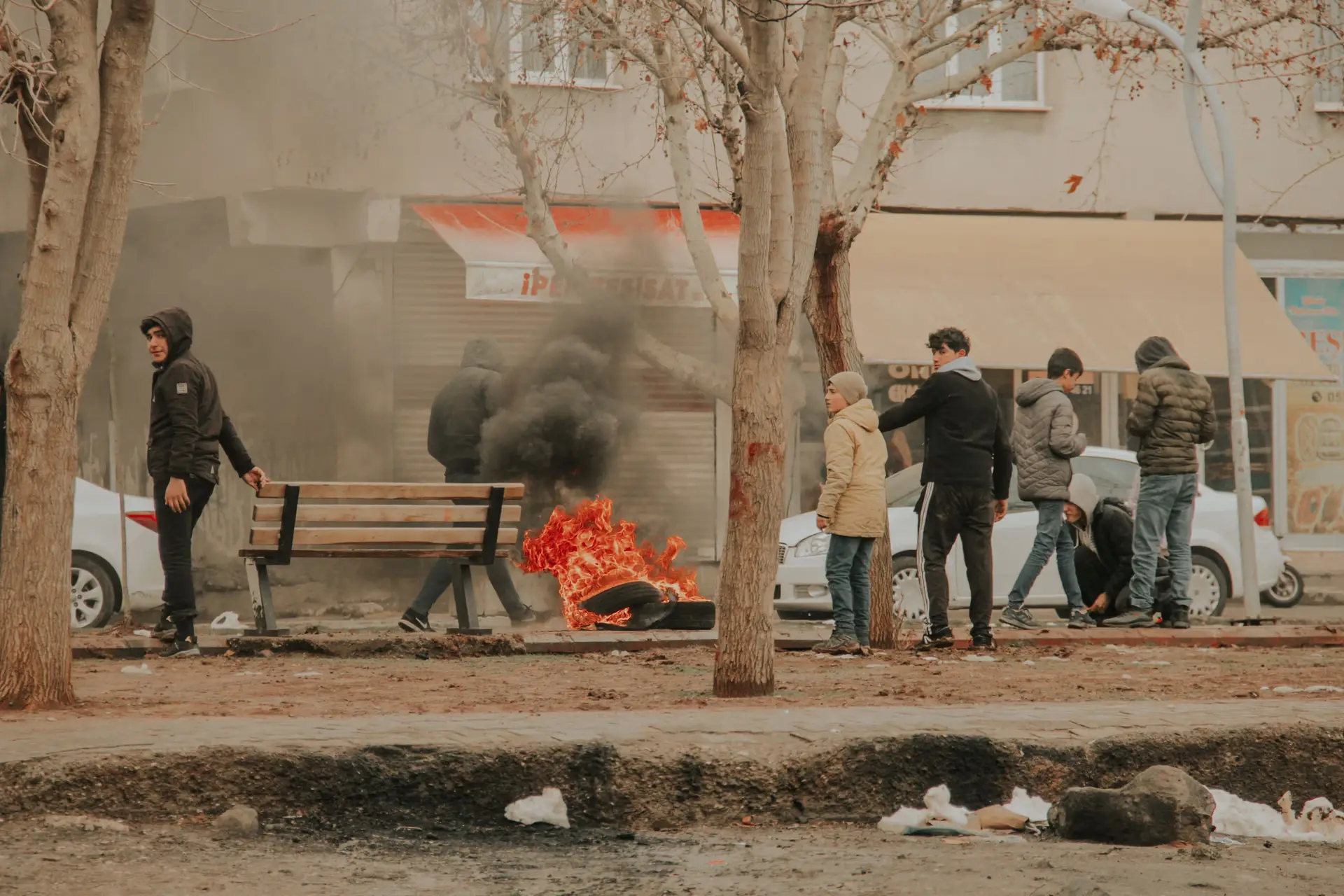 France Burns While Macron Wanders the Gulf